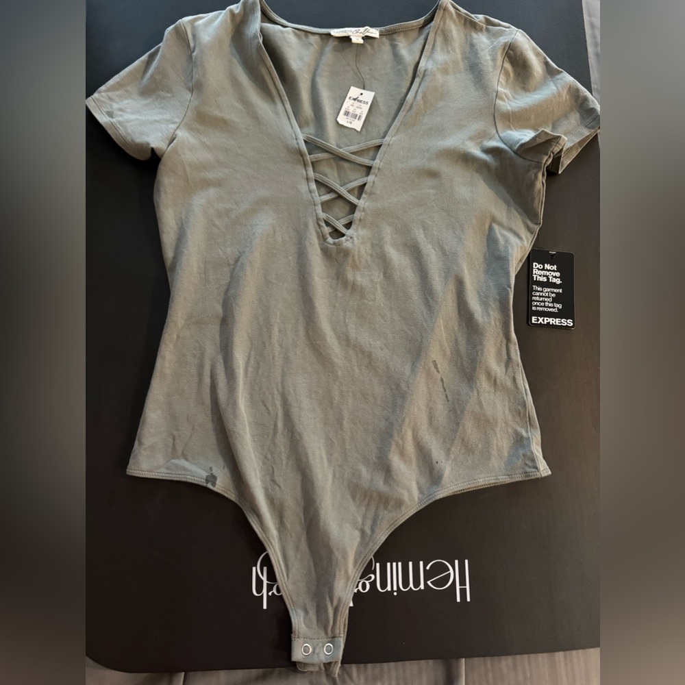 NWT Express short sleeve body suit.